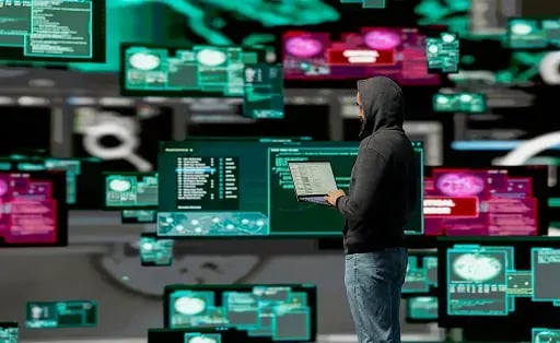 hacker monitoring systems with laptop using attack surface management asm software